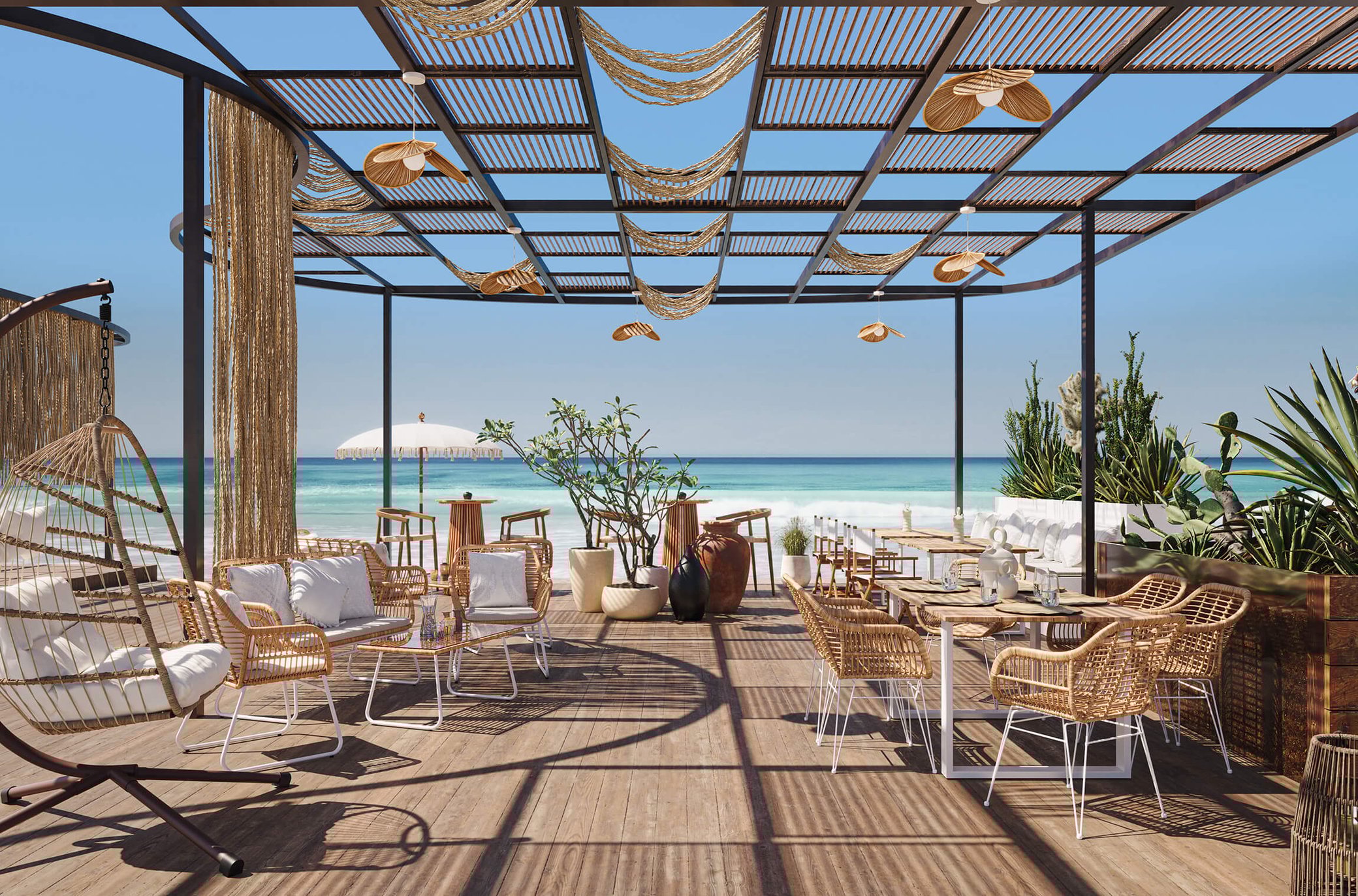 Luxury beachfront outdoor furniture setup with modern rattan chairs